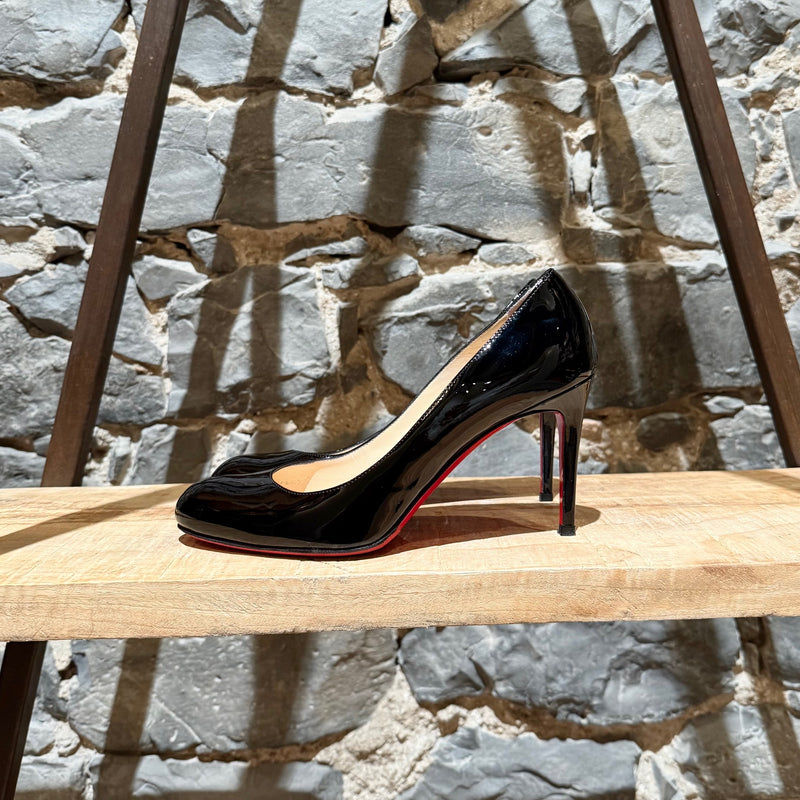 One side of Christian Louboutin Black Patent Leather Simple Pumps 85 Heels