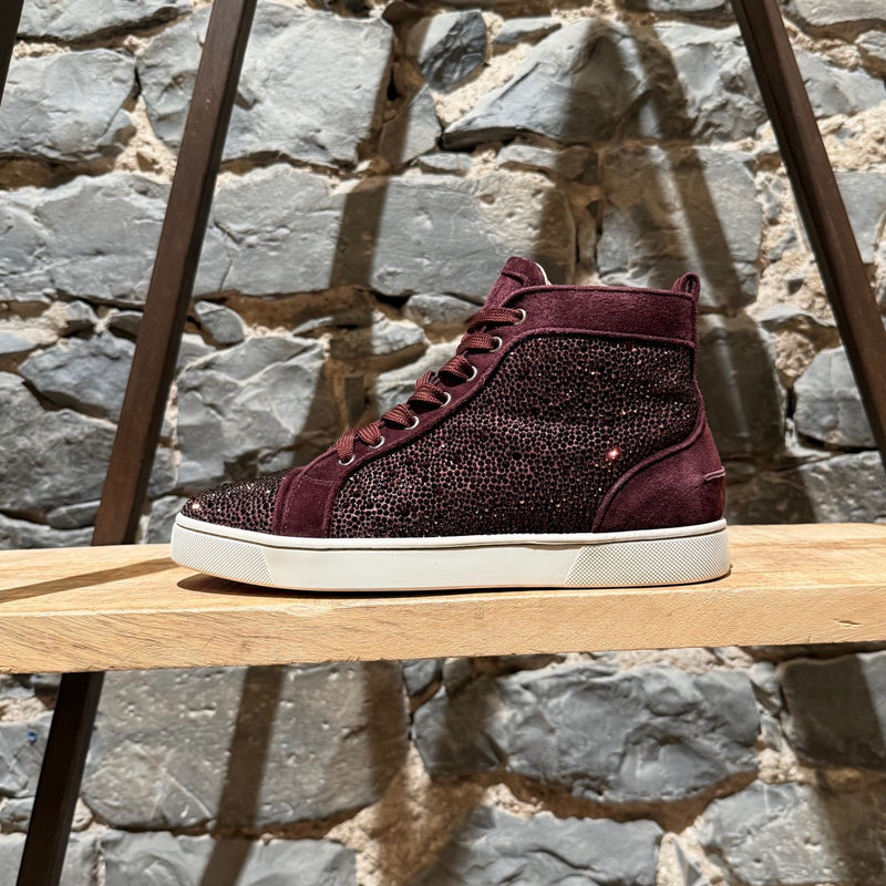 A side view of Christian Louboutin Burgundy Suede Louis Strass High-top Sneakers