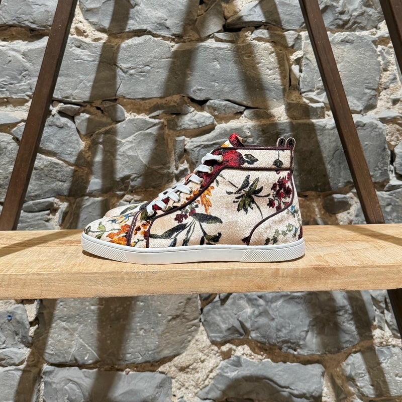 One side of Christian Louboutin Floral Velvet Bip Bip Orlato High-top Sneakers