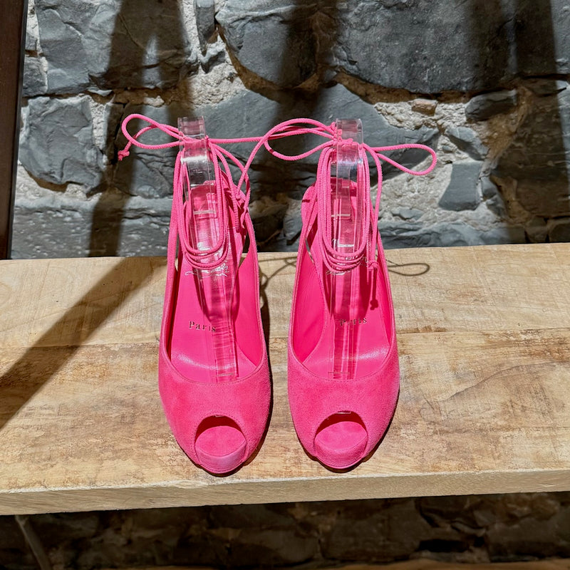 Top view of Christian Louboutin Hot Pink Suede Lace Up NVP 120 120 Peep Toe Pumps