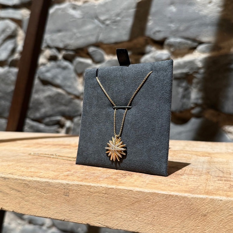 Side front view of David Yurman 18k Yellow Gold Diamond 19mm Starbust Pendant Necklace