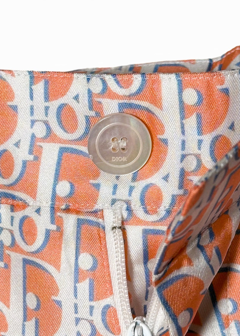 Close up on button of Dior 2021 Orange Blue Oblique Satin Silk Bermuda Shorts