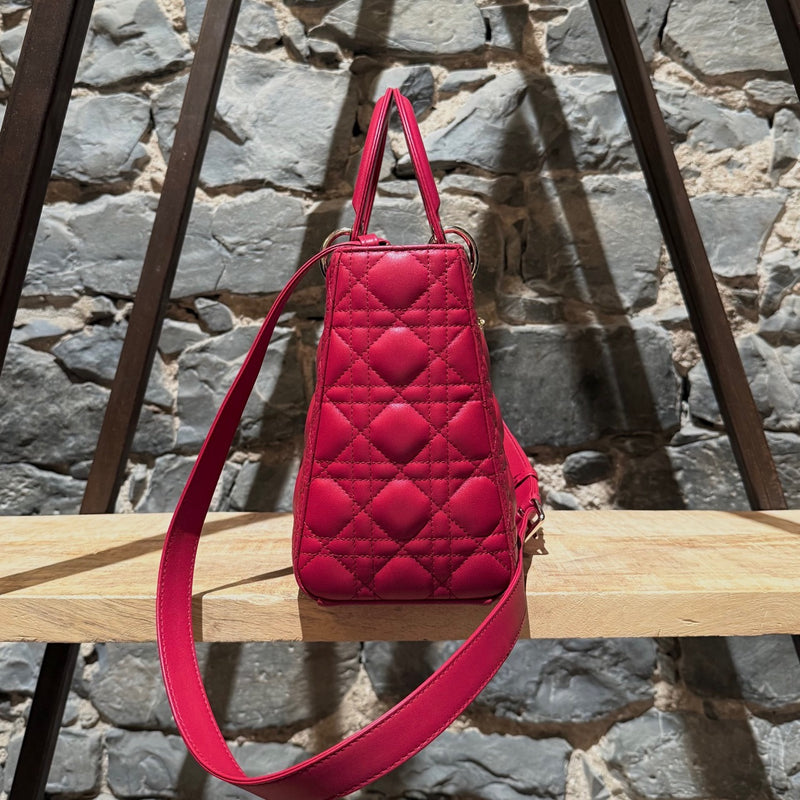 A side view of Dior 2022 Fuchsia Pink Lambskin Cannage Medium Lady Dior Handbag