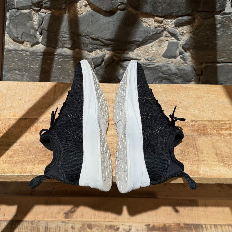 Side-by-side view of Dior B25 Black Mesh Logo Sneakers