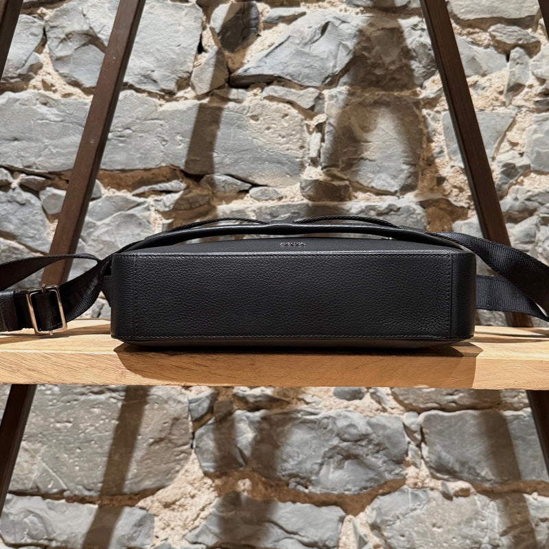 Bottom view of Dior Black Grained Leather Maxi Safari Messenger Bag