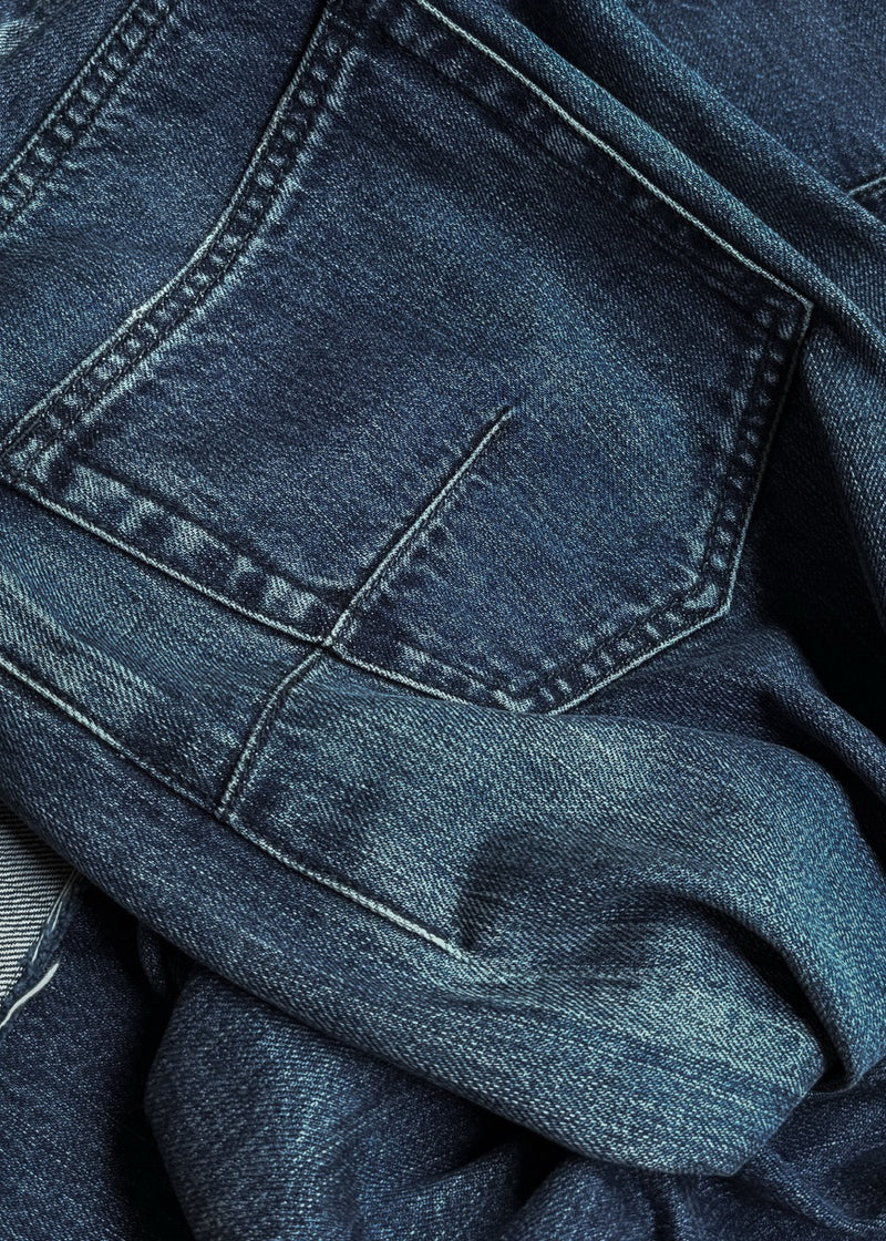 Close-up on Dior Blue J'Adior Cuff Boyfriend Jeans