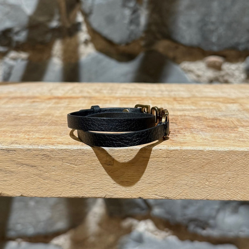 A side view of Dior J'adior Black Leather Double Wrap Bracelet