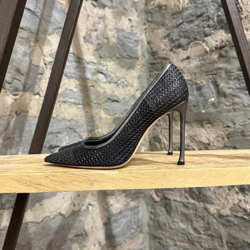 A side view of Dior Silver Black Metallic Mesh Pointy Pumps