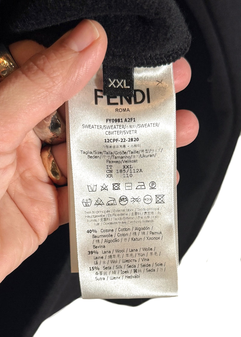 Size, care and material labels of Fendi Black FF Zucca Logo Bands Hoodie