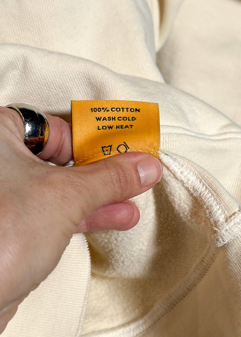 Material and care label of Gallery Dept. Ivory Gym Hoodie