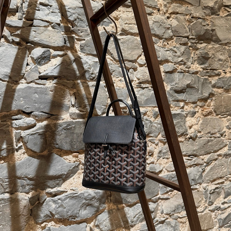 Suspended with shoulder straps view of Goyard 2019 Black Goyardine Mini Alpin Convertible Backpack