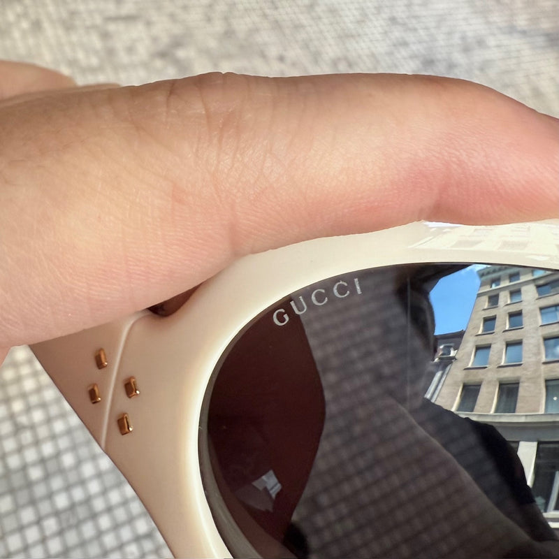 Branded lenses of Gucci 1381 Beige Shield Frame Injection Sunglasses