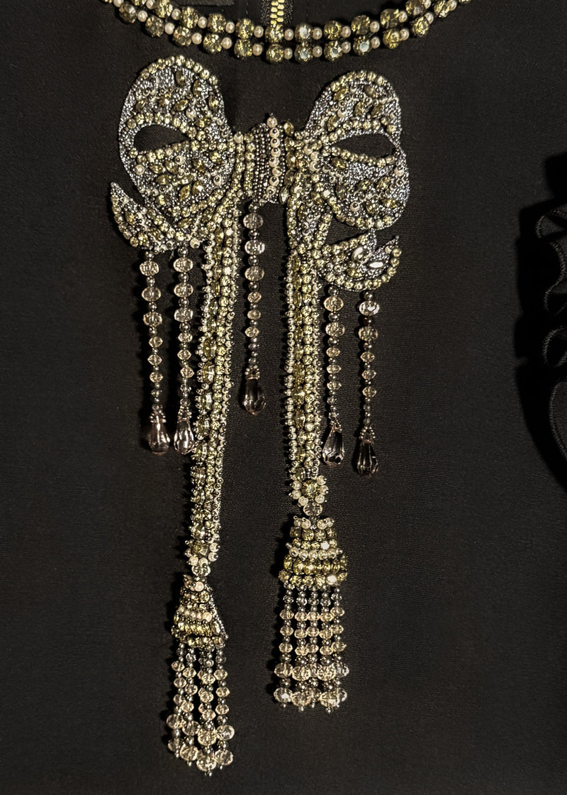 Bow detail of Gucci 2016 Embellished Bow Ruffled Sleeves Black Mini Dress