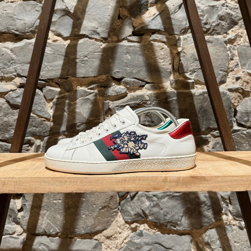 One side of Gucci 3 Little Pigs Embroidered Ace White Leather Sneakers