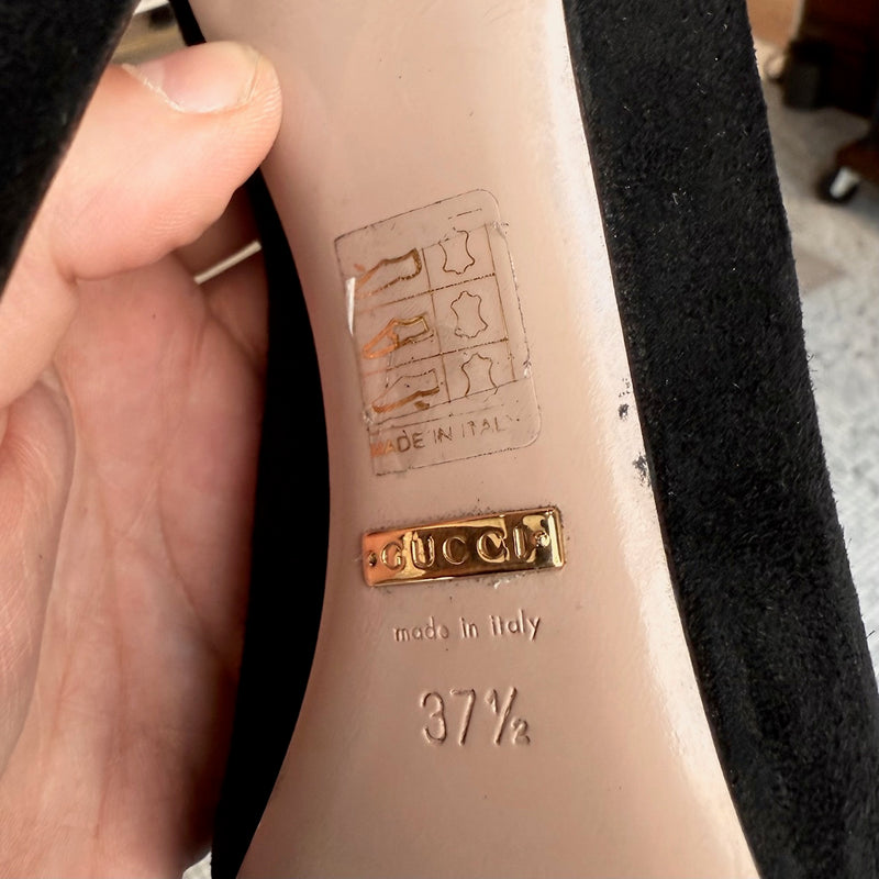 Plaque and stamps of Gucci Black Suede Crystal Horsebit Pumps