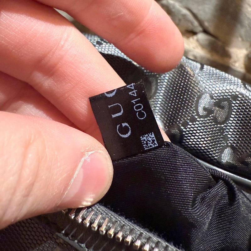 Interior close up of Gucci GG Monogram Imprimé Grey Belt Bag