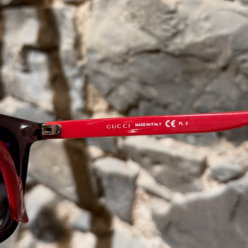 An inside branch of Gucci GG3588 Transparent Blue Red Web GG Sunglasses