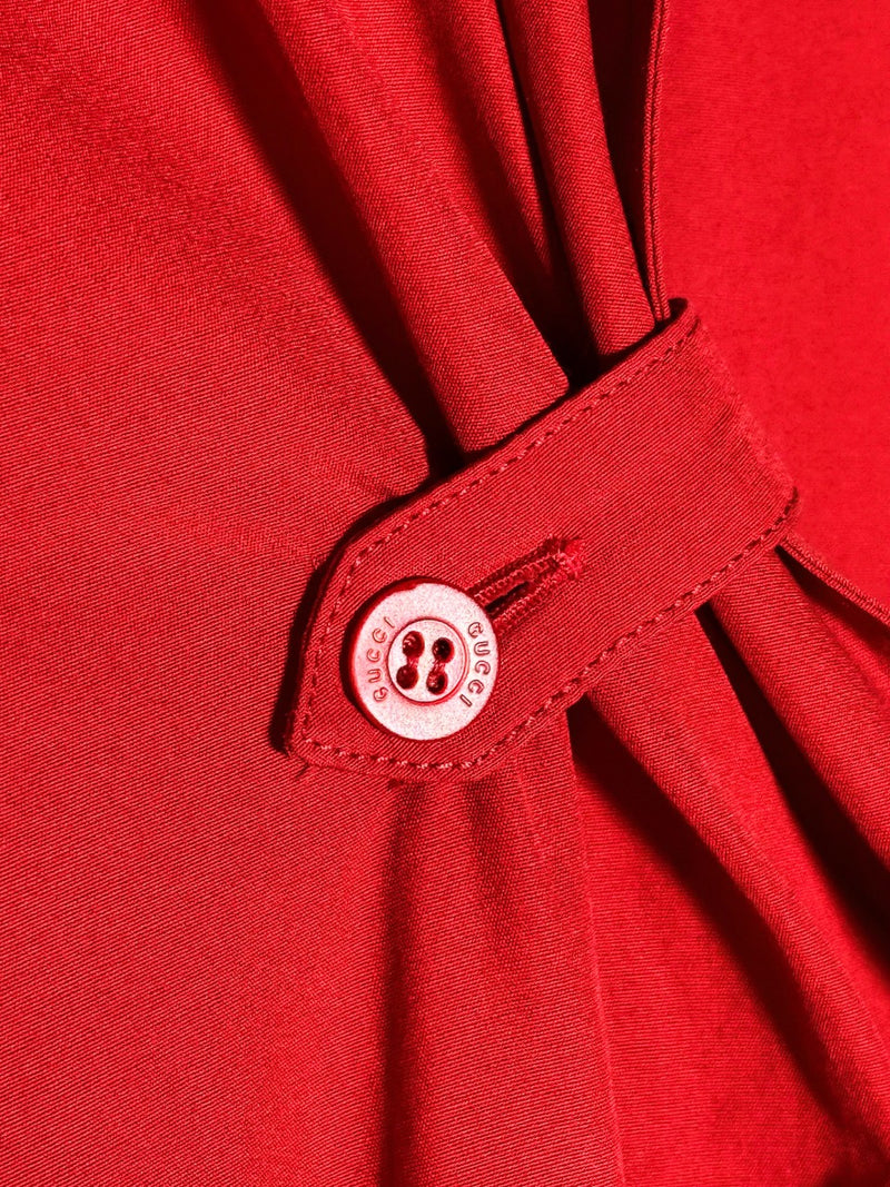 Close up on branded button of Gucci Red Cotton Short Sleeves Dress