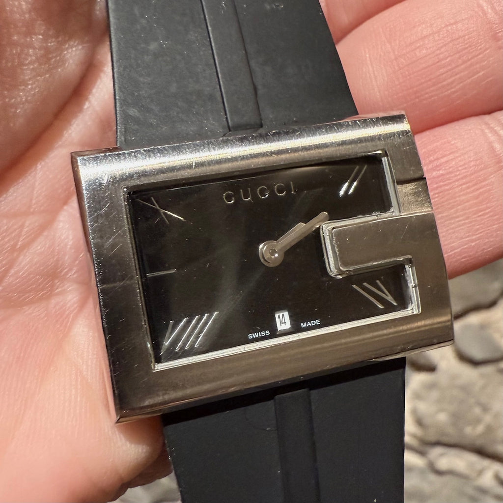 Close-up on Gucci Stainless 100M G Series Rubber Band Quartz Watch