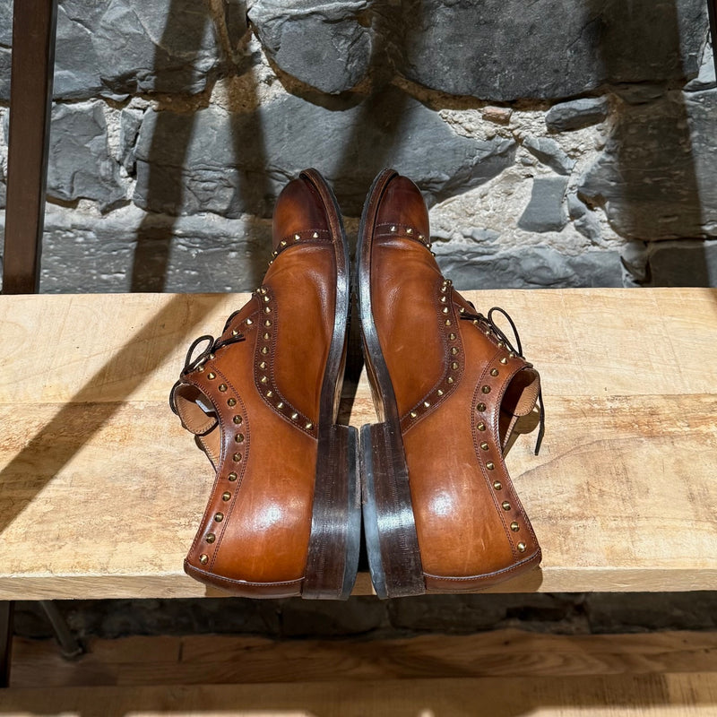 Side-by-side view of Gucci Studded Brown Leather Lace-up Shoes