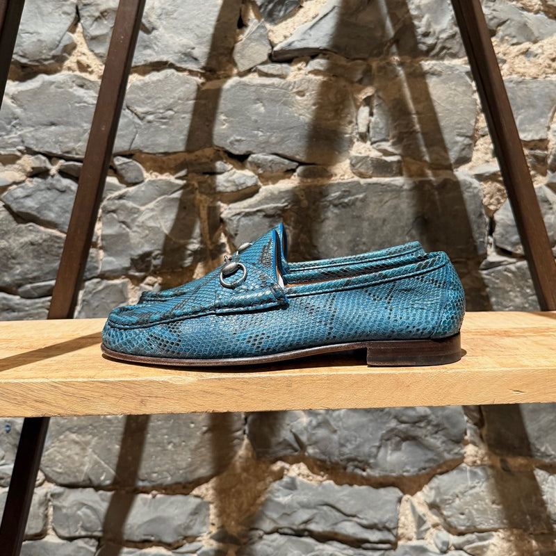 A side view of Gucci Turquoise Python Horsebit Loafers