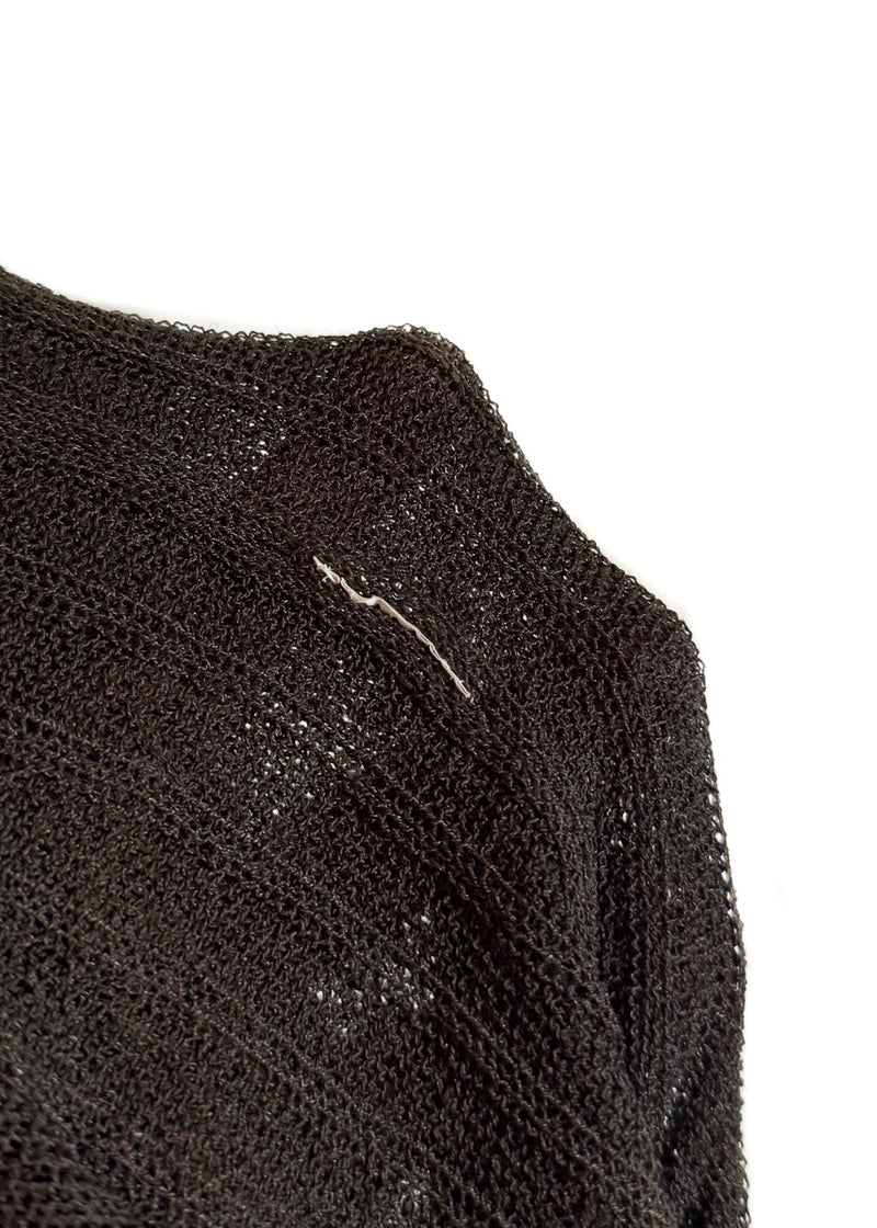 Close up on removed care label of Gucci Vintage 90s Brown Light Knit Cardigan Sweater