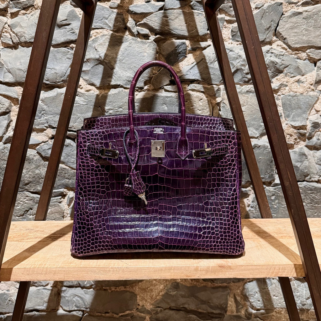 Front view of Hermès 2014 Amethyst Shiny Porosus Crocodile Birkin 35 Bag with palladium hardware