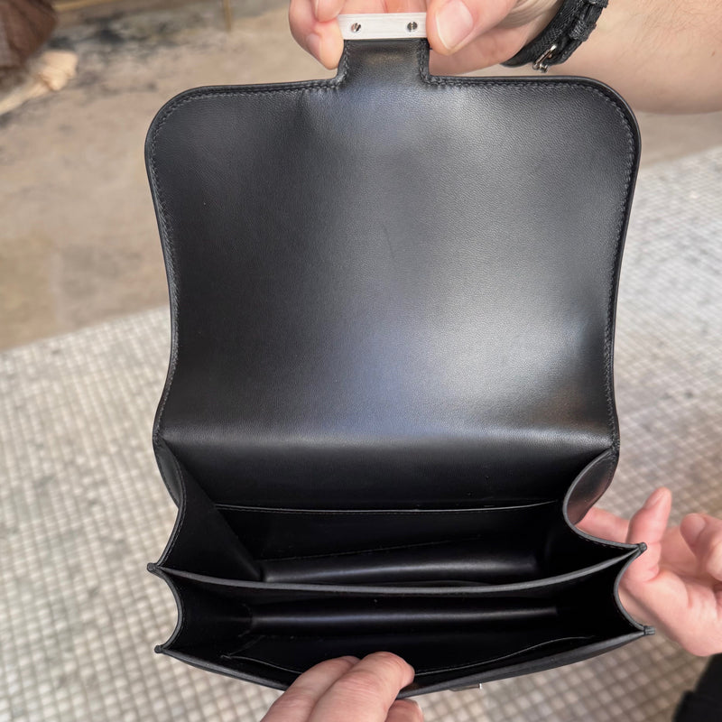Interior of Hermès 2021 Limited Edition Black Monsieur Studio Disco Mini Constance III 18 Bag