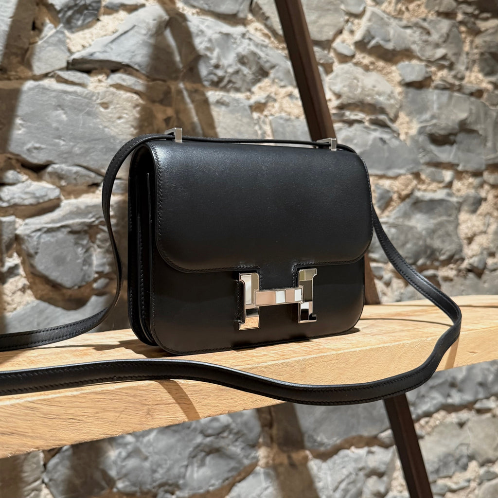 Side front view of Hermès 2021 Limited Edition Black Monsieur Studio Disco Mini Constance III 18 Bag