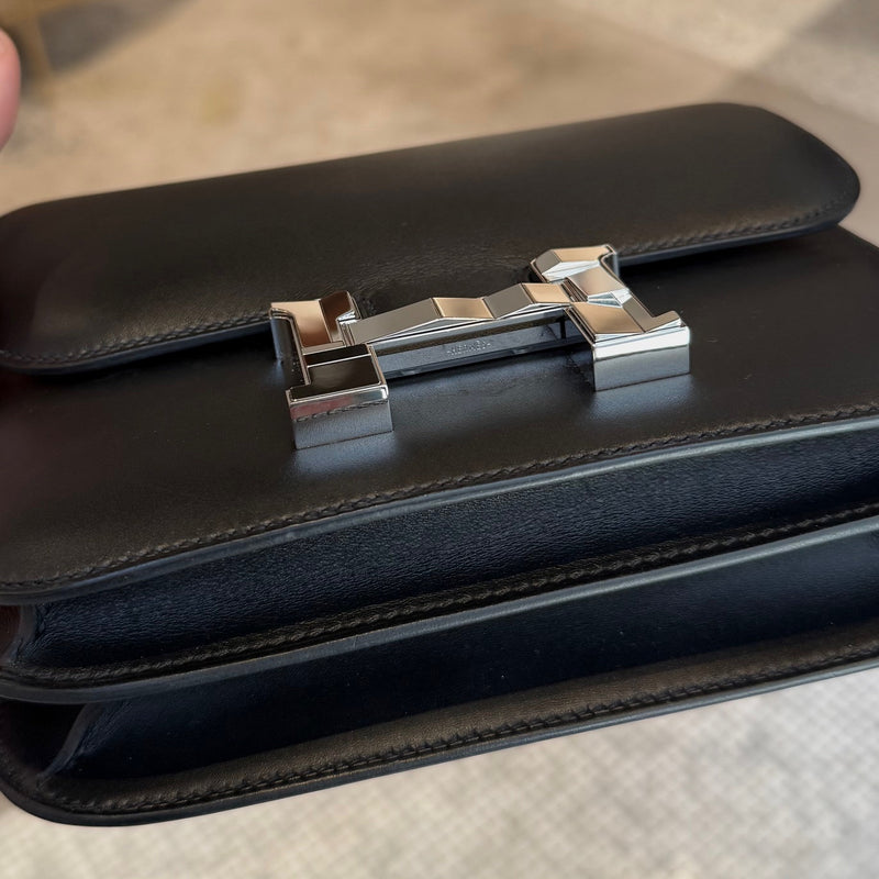 Bottom view of Hermès 2021 Limited Edition Black Monsieur Studio Disco Mini Constance III 18 Bag