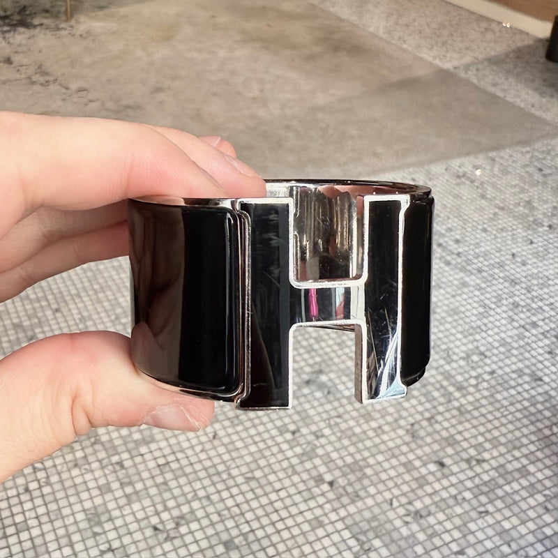 Brand detail on Hermès Black Enamel Extra Wide Clic Clac H PHW Bracelet