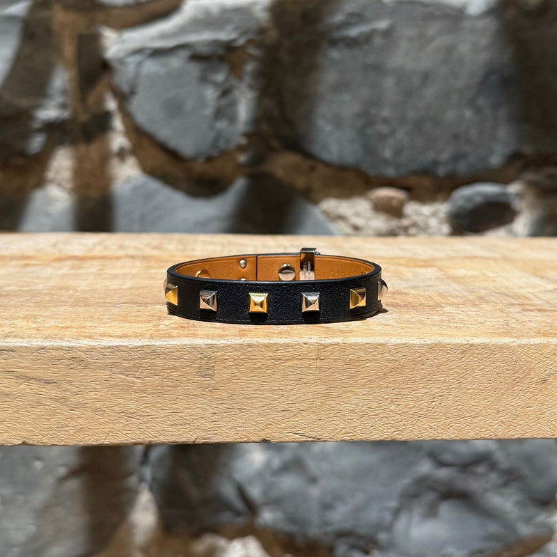Front view of Hermès Black Leather Mini Dog Gold Platinum Studded Bracelet