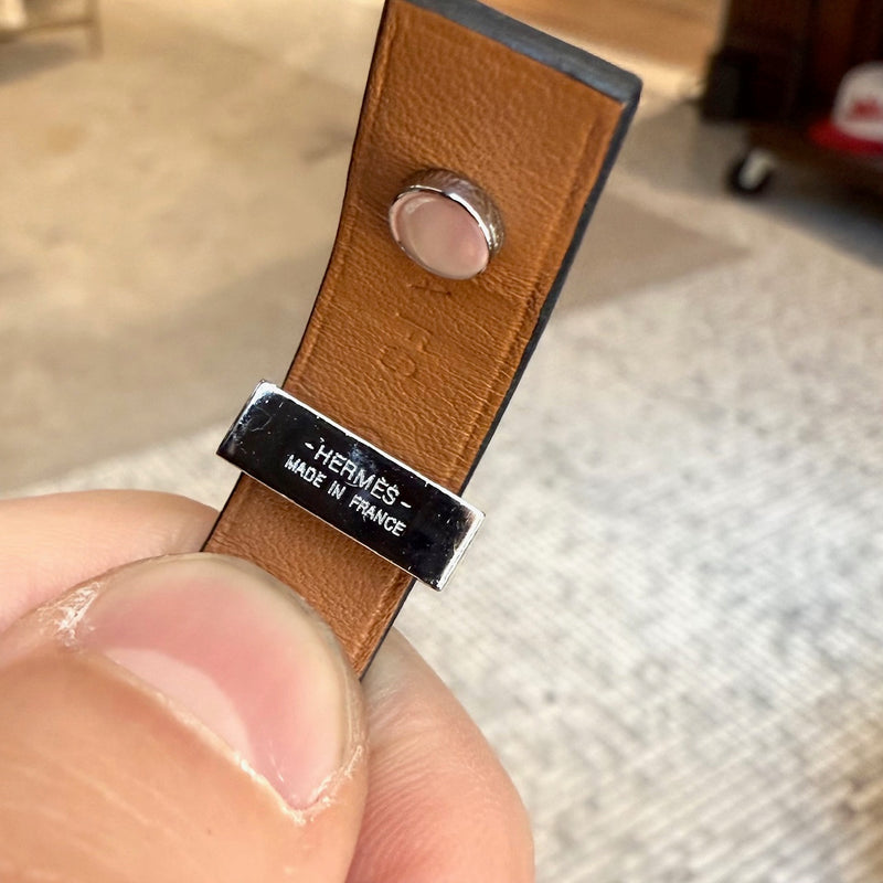 Branded hardware of Hermès Black Leather Mini Dog Gold Platinum Studded Bracelet