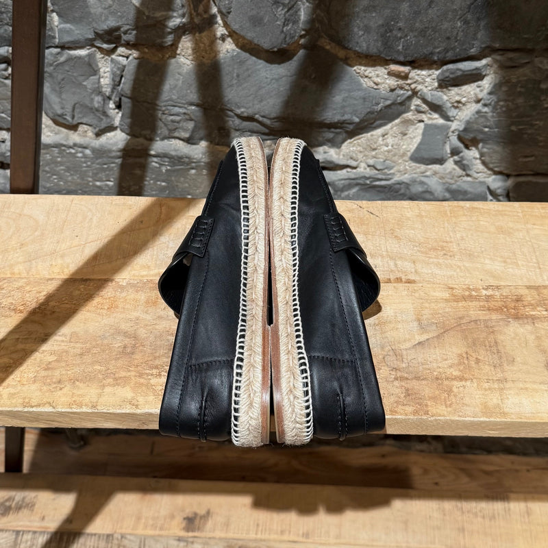 Side-by-side view of Hermès Black Leather Trip H Mocassin Espadrilles