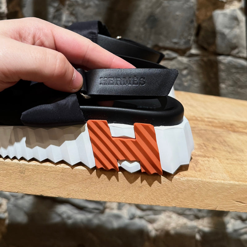 Brand details on Hermès Black Nylon Electric Criss Cross Sandals