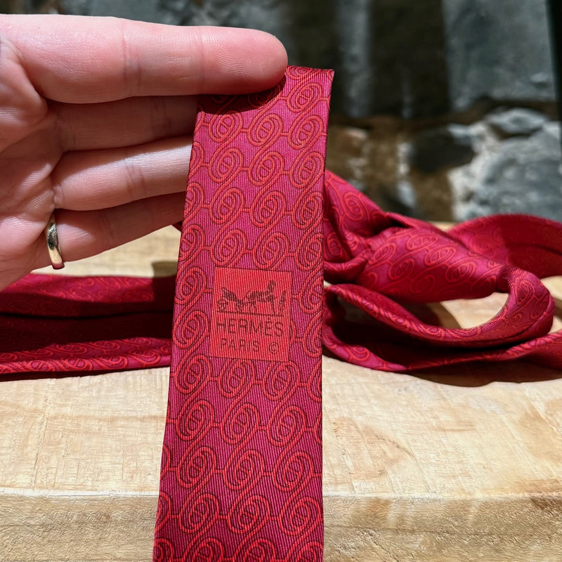 Brand label of Hermès Chaine D'Ancre Pattern Raspberry Red Tonal Silk Tie