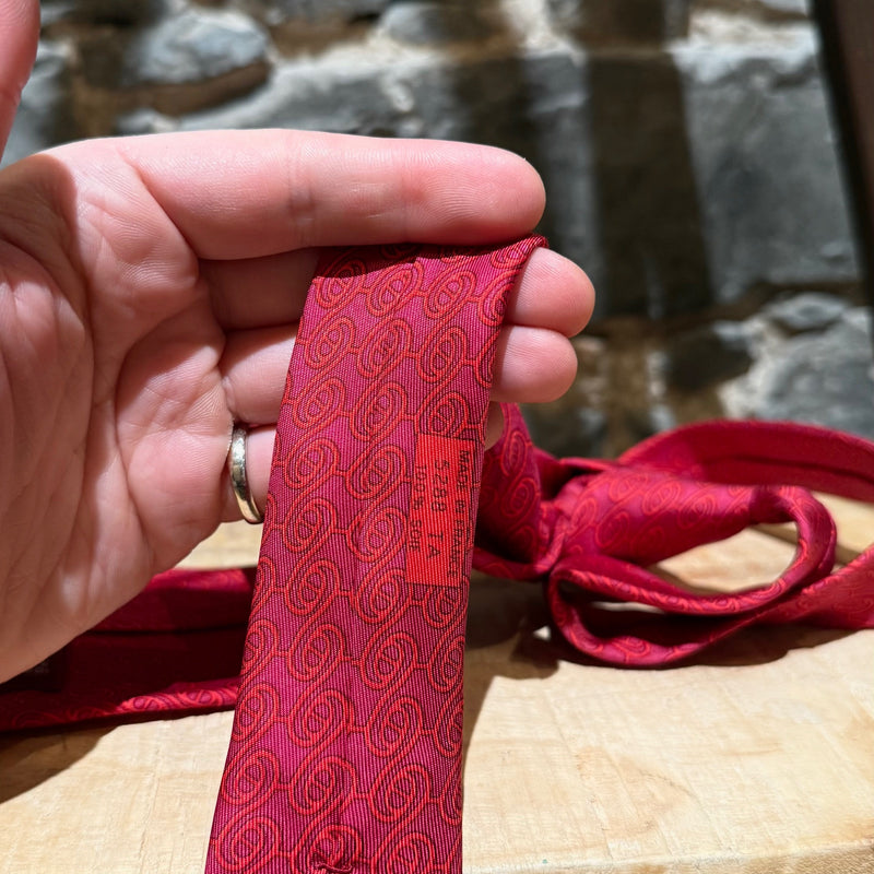 Origin and material label of Hermès Chaine D'Ancre Pattern Raspberry Red Tonal Silk Tie