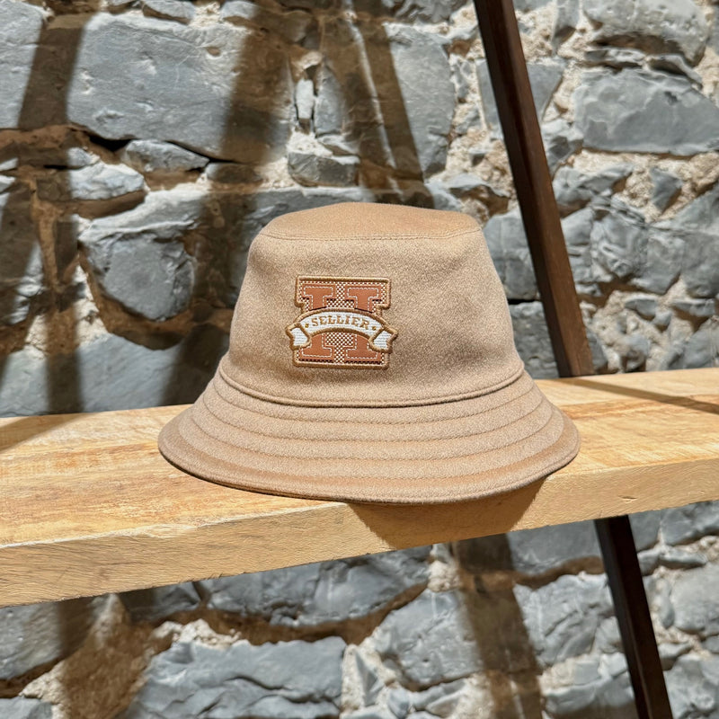 Side front view of Hermès Harper H Sellier Beige Cashmere Bucket Hat