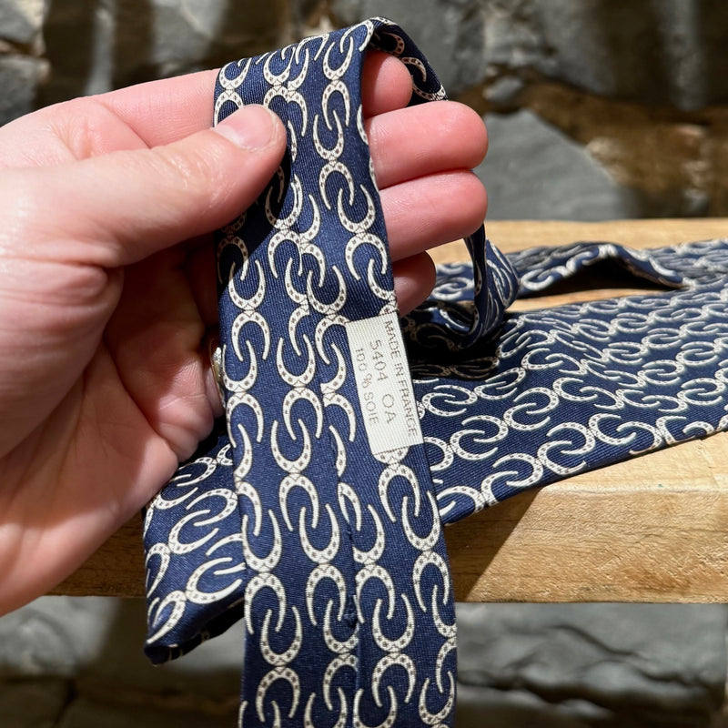 Origin and material label of Hermès Horseshoe Prints Navy Silk Tie