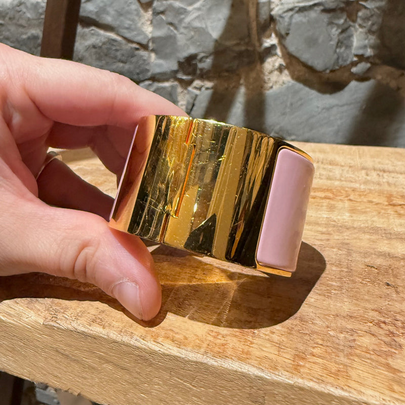 Close-up on Hermès Pink Enamel Extra Wide Clic Clac H Gold Plated Bracelet