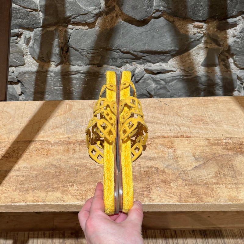 Side-by-side view of Hermès Yellow Ancone Thalassa Chaine d'Ancre Sandals