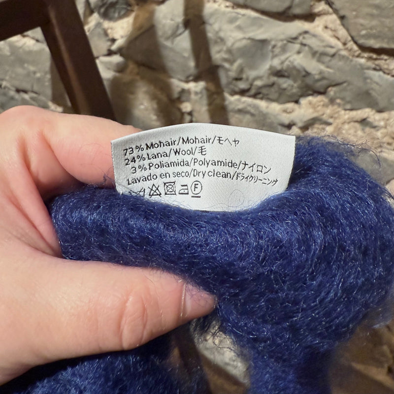 Material and care label of LOEWE Blue Mohair Embroidered Anagram Oversized Scarf 