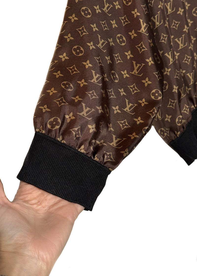 A sleeve of Louis Vuitton 2021 Brown Monogram Silk Sporty Sweater