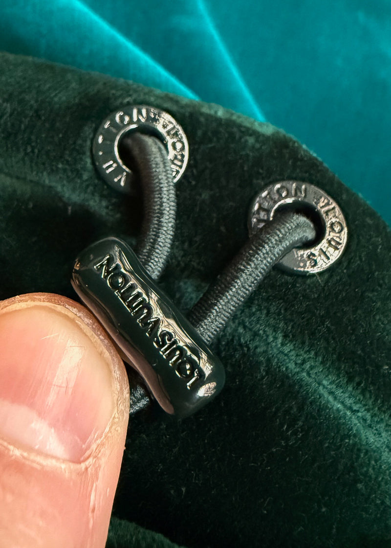 Drawstrings close up of Louis Vuitton 2022 Colorblock Green Technical Tape Velvet Windbreaker Jacket