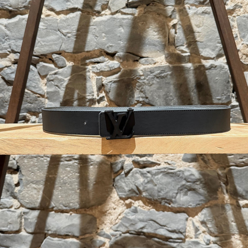 Black side front view of Louis Vuitton 2022 Grey Taurillon Monogram Flower LV Shape Reversible Belt