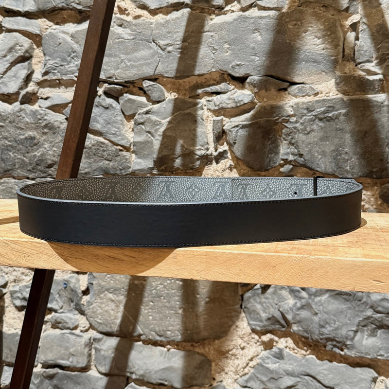 A Black side view of Louis Vuitton 2022 Grey Taurillon Monogram Flower LV Shape Reversible Belt
