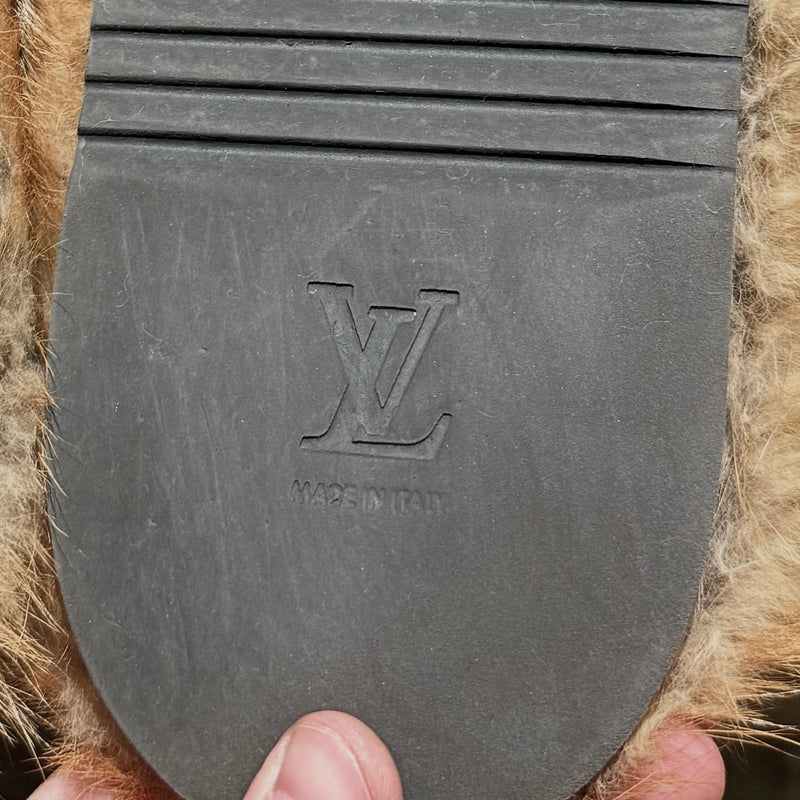 Embossed Brand and origin on an outsole of Louis Vuitton 2021 Dyed Fox Fur LV Easy Mules