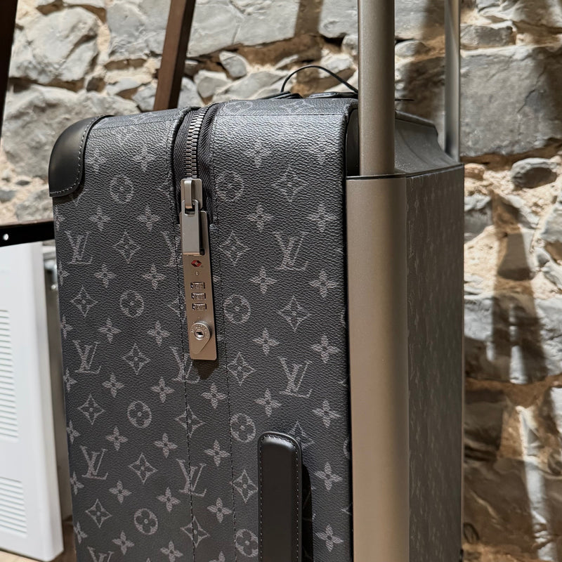 A side view of Louis Vuitton Horizon 70 Monogram Eclipse Luggage