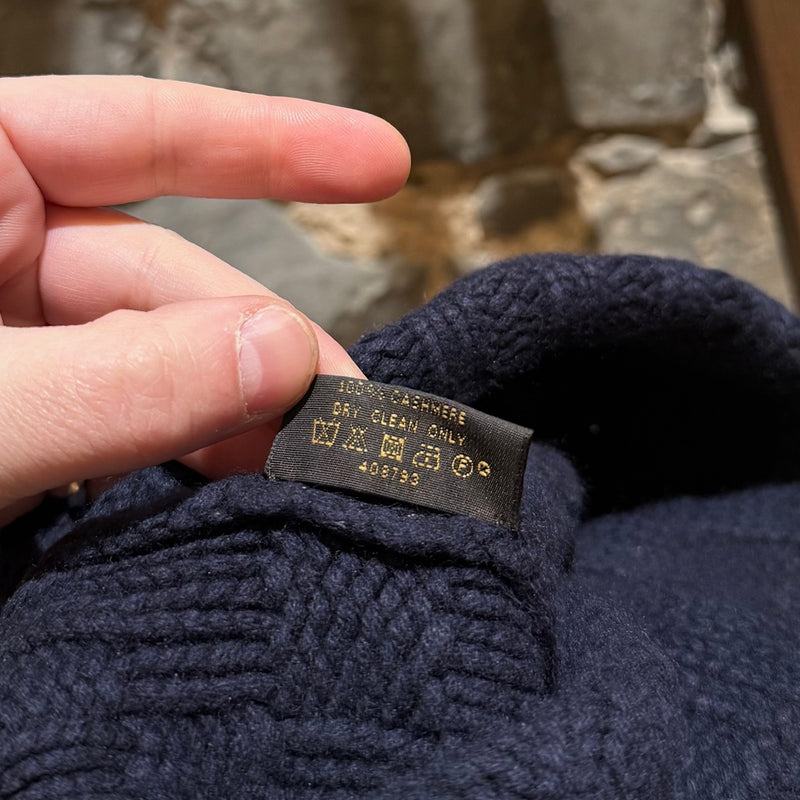 Material and care label of Louis Vuitton Navy Cashmere Damier Pattern Helsinki Beanie