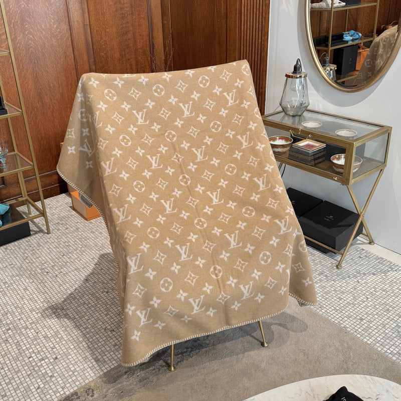 One side of Louis Vuitton Neo Monogram Beige Wool Blend Blanket